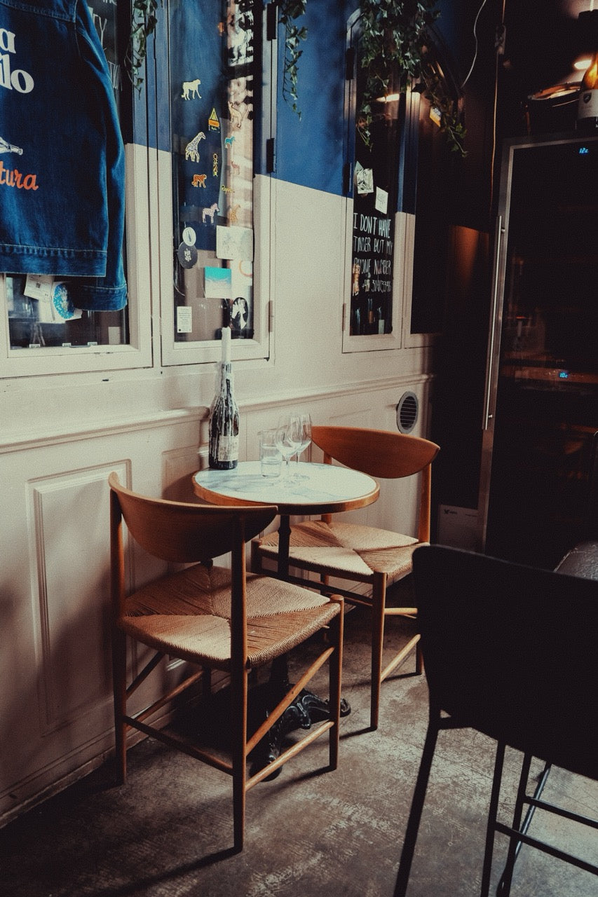 Sunlit table by the window at Vinoria Lilo